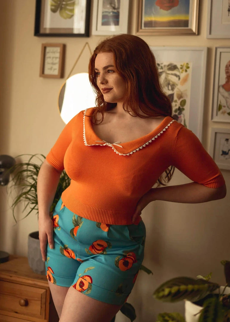 New In Collectif Babette Heart Trim 50's Jumper Orange Colour